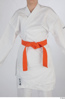 Selin dressed jiu-jitsu kimono orange belt sports upper body 0001.jpg